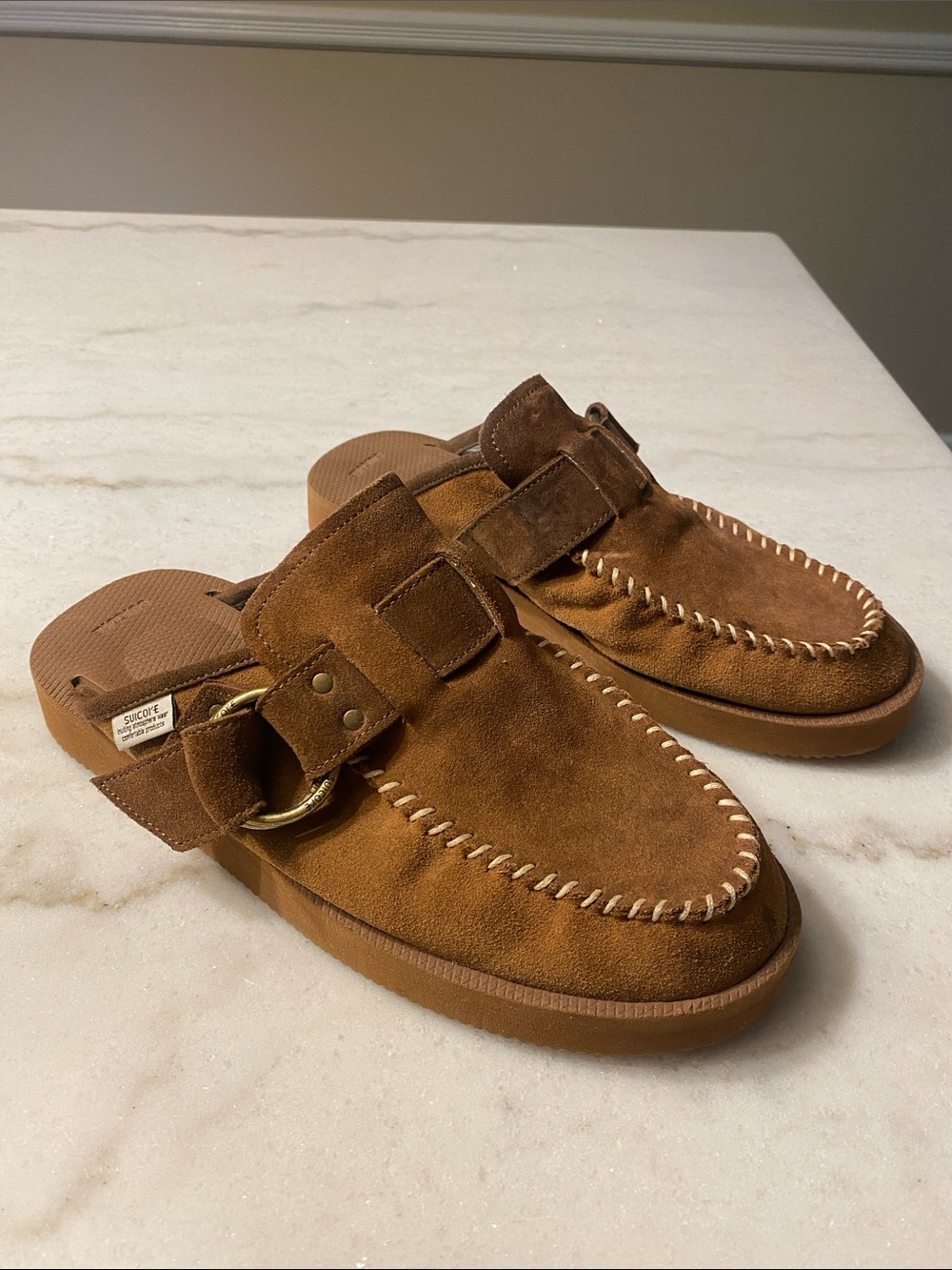 Suicoke tan mules with contrast stitching. Size US 9